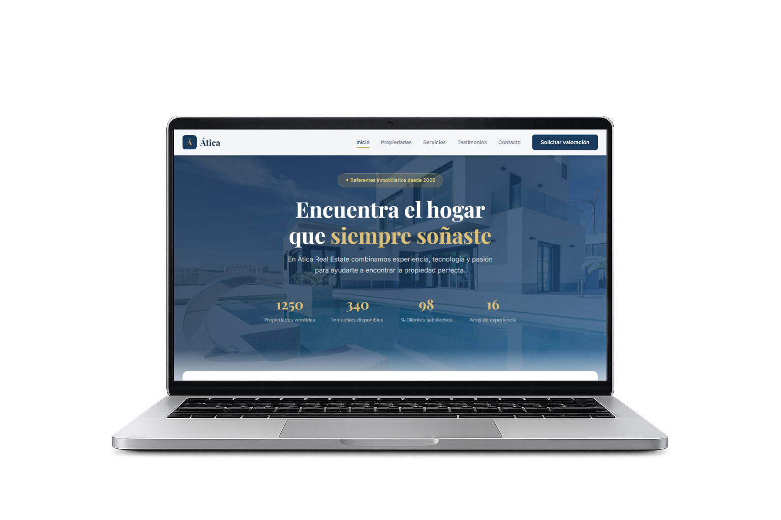 Vista previa de la web de Ática Real Estate en un portátil.